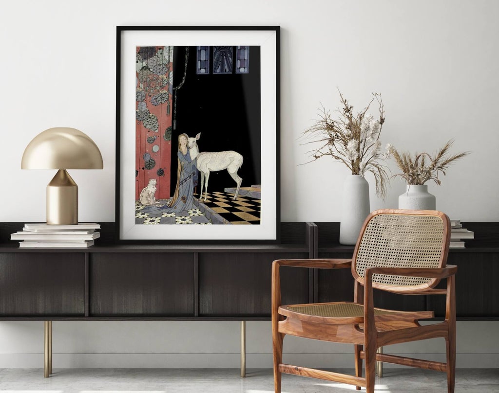 A free printable art piece from the public domain is displayed in a frame on the counter of an aesthetic room.